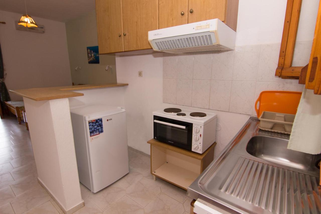 Studios Avra Agios Georgios  ภายนอก รูปภาพ